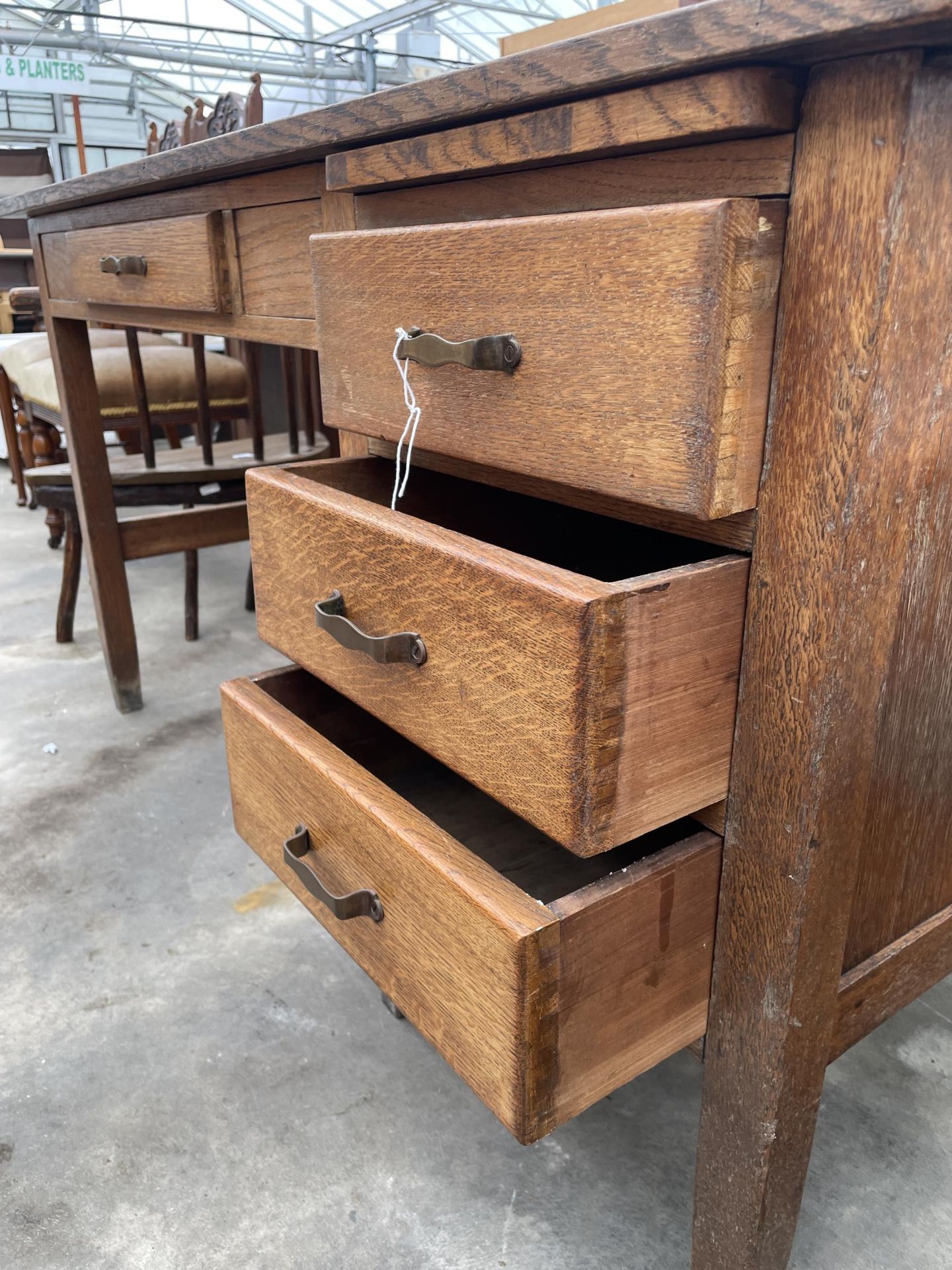 A MID 20TH CENTURY OAK SINGLE PEDESTAL WRITING DESK WITH IMPRESSED MARK 'CADBURY 1930', 54 X 27", - Image 4 of 5