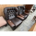 A PAIR OF BROWN LEATHER BUTTON-BACK EASY CHAIRS