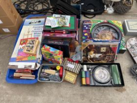 A LARGE ASSORTMENT OF TOYS AND GAMES TO INCLUDE ROULETTE SETS, BOARD GAMES, CHESS SETS AND JIGSAWS