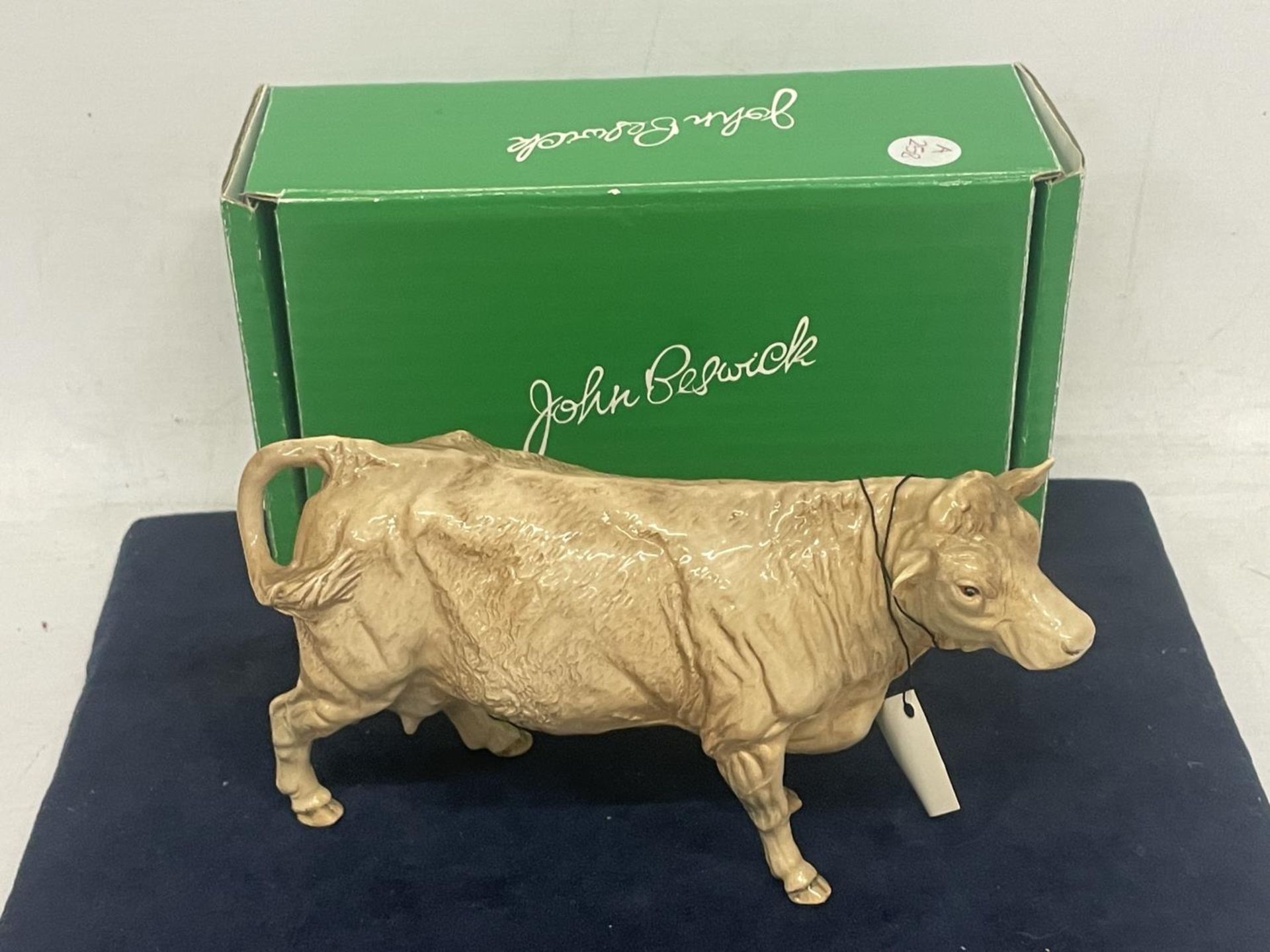 A BESWICK CHAROLAIS COW WITH BOX