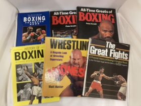 SIX HARDBACK BOOKS ON THE SUBJECTS OF WRESTLING AND BOXING