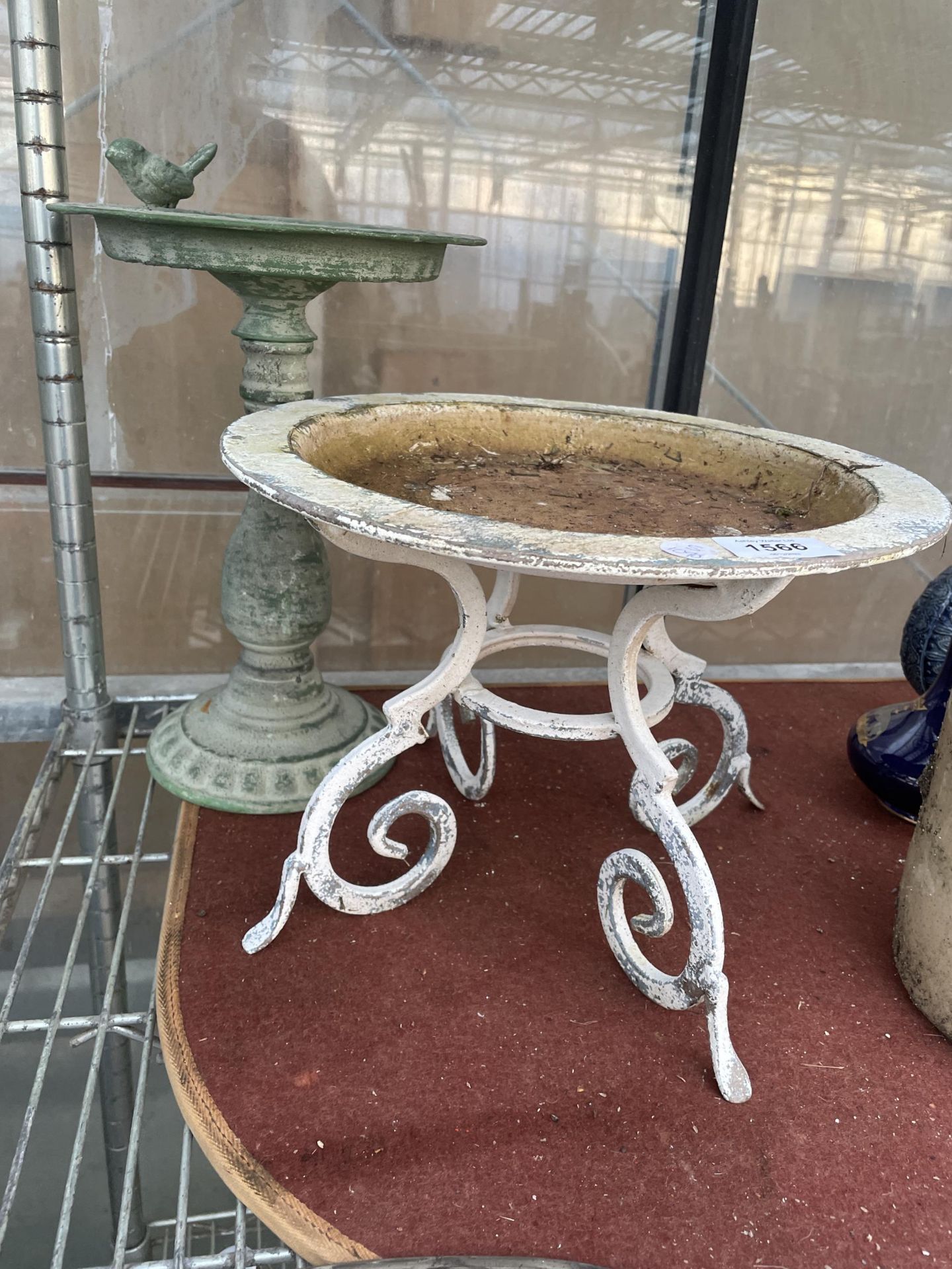 TWO VINTAGE METAL BIRD BATHS