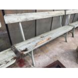 A VINTAGE WOODEN RAILWAY BENCH WITH CAST BENCH ENDS (L:167CM)