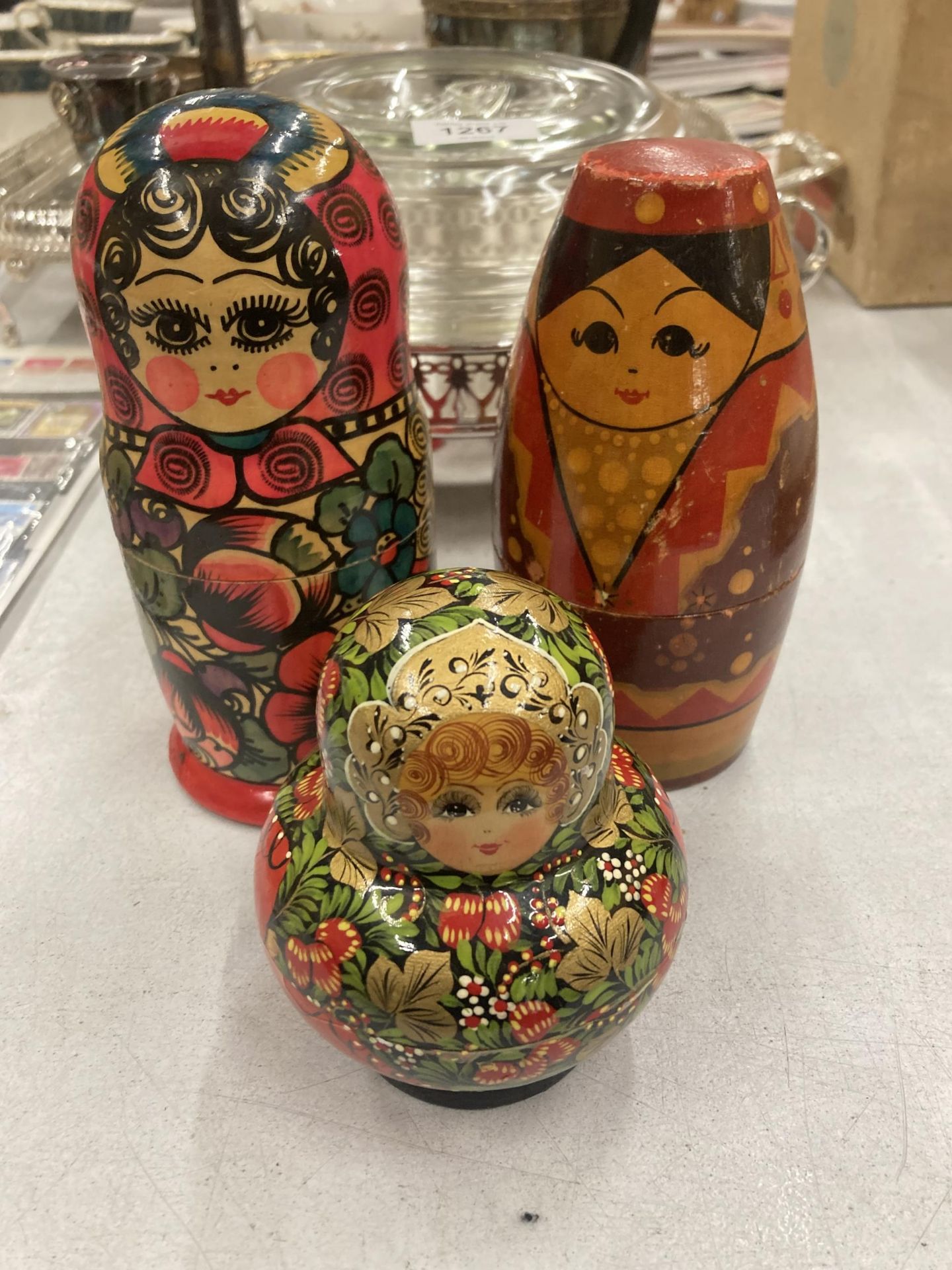 A GROUP OF THREE RUSSIAN LACQUERED DOLLS