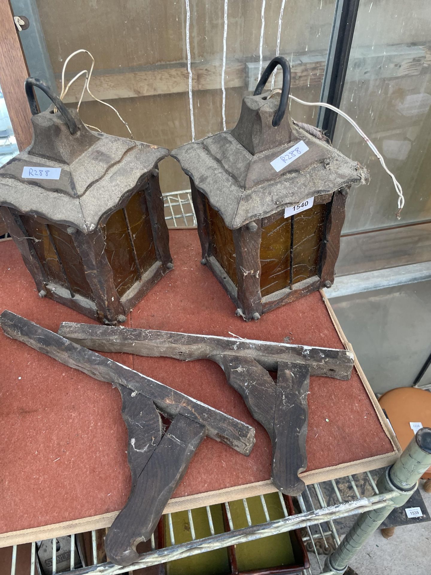 A PAIR OF OAK LANTERNS WITH YELLOW GLASS AND WALL HANGING BRACKETS - Image 2 of 2