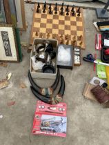 AN ASSORTMENT OF ITEMS TO INCLUDE TROPHIES, A CHESS SET AND BOARD AND AN AIRFIX MODEL KIT ETC