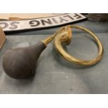 A VINTAGE BRASS CAR HORN