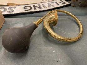 A VINTAGE BRASS CAR HORN