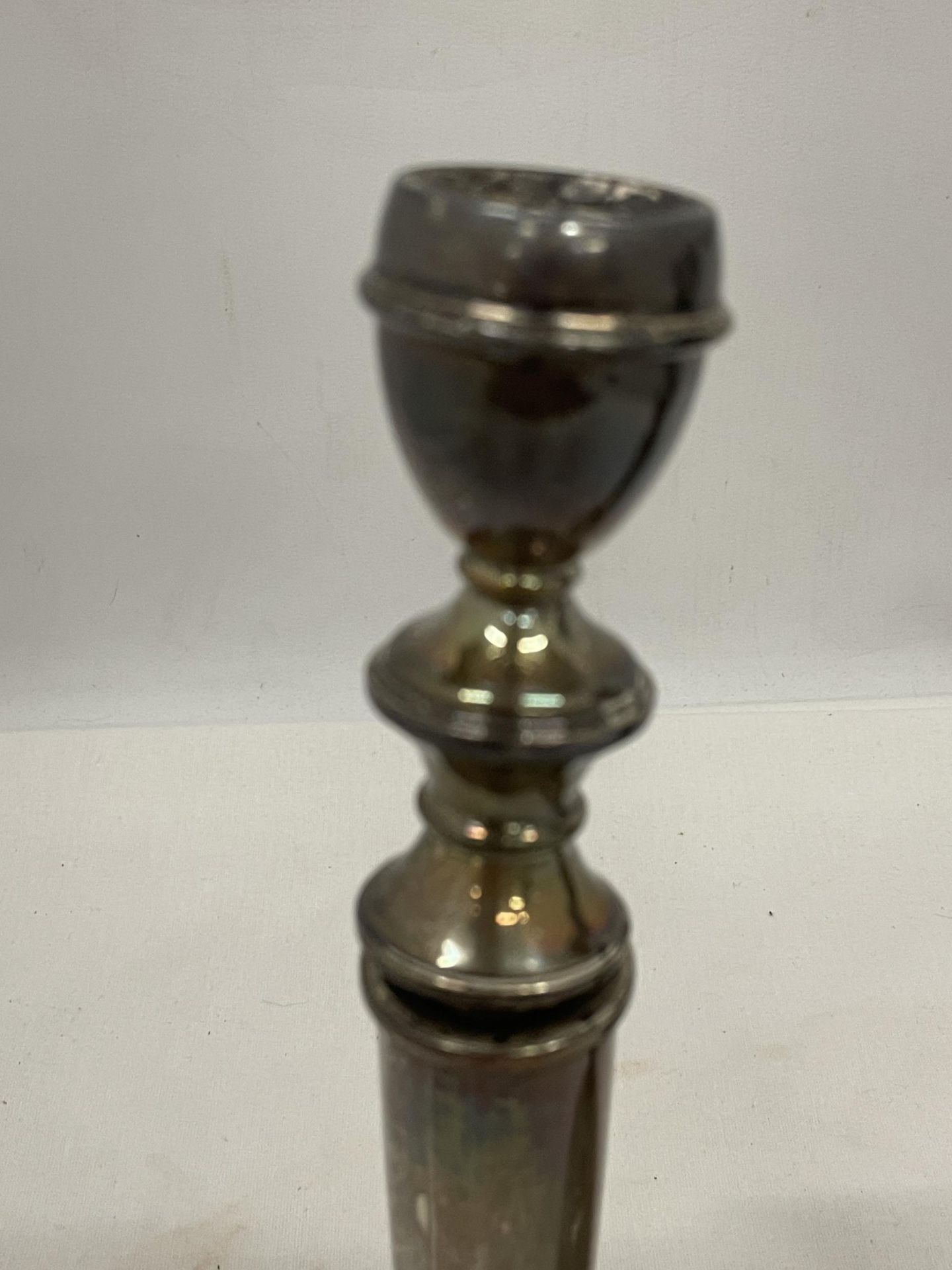 A PAIR OF HALLMARKED BIRMINGHAM SILVER CANDLESTICKS (ONE A/F) WITH WEIGHTED BASES - Image 2 of 5