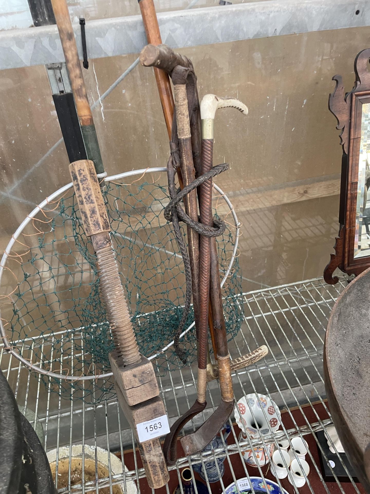 AN ASSORTMENT OF VINTAGE RIDING CROPS, A FISHING NET AND A VICE ETC - Image 2 of 2