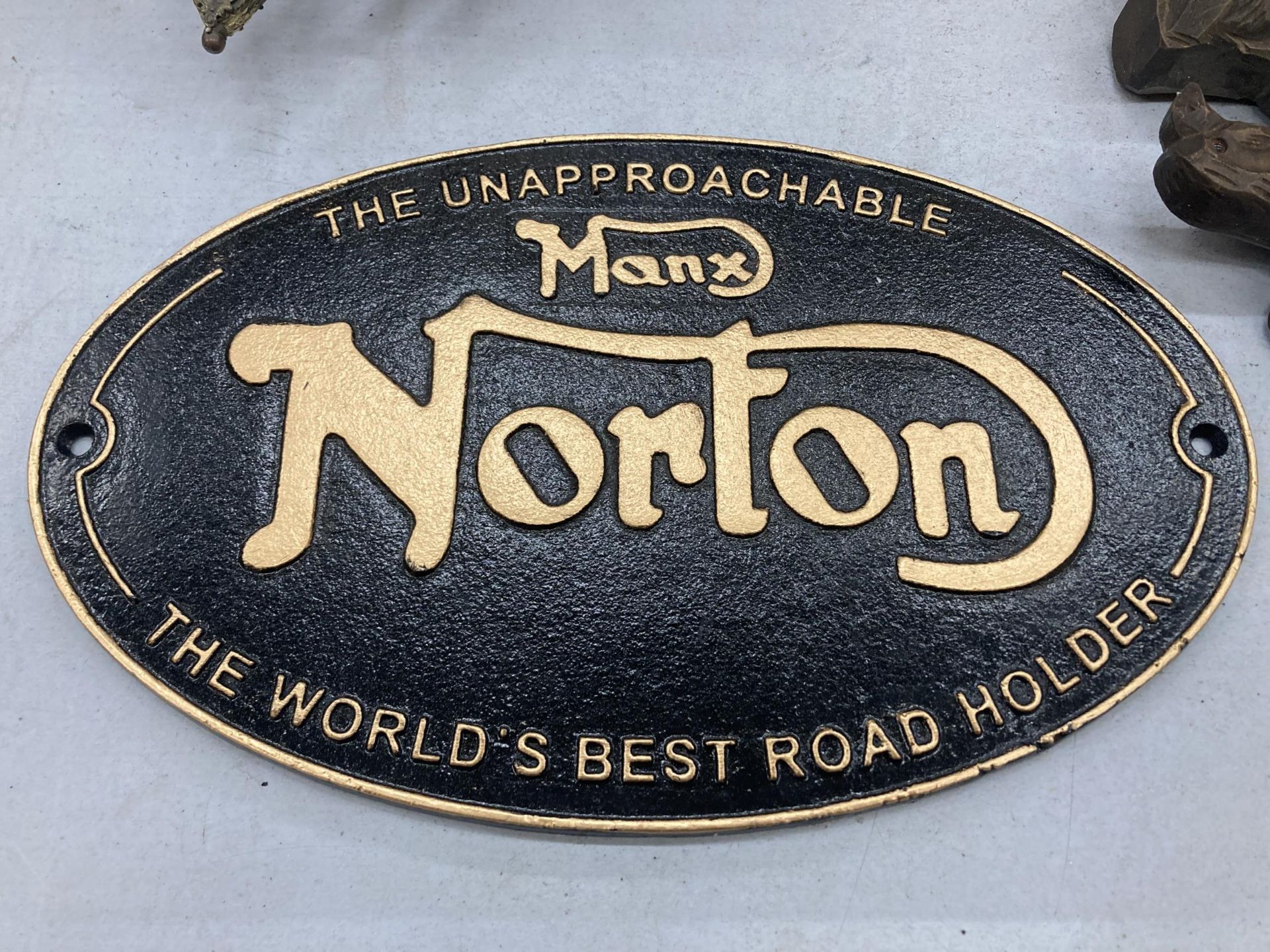 A CAST NORTON SIGN, 33CM X 20CM