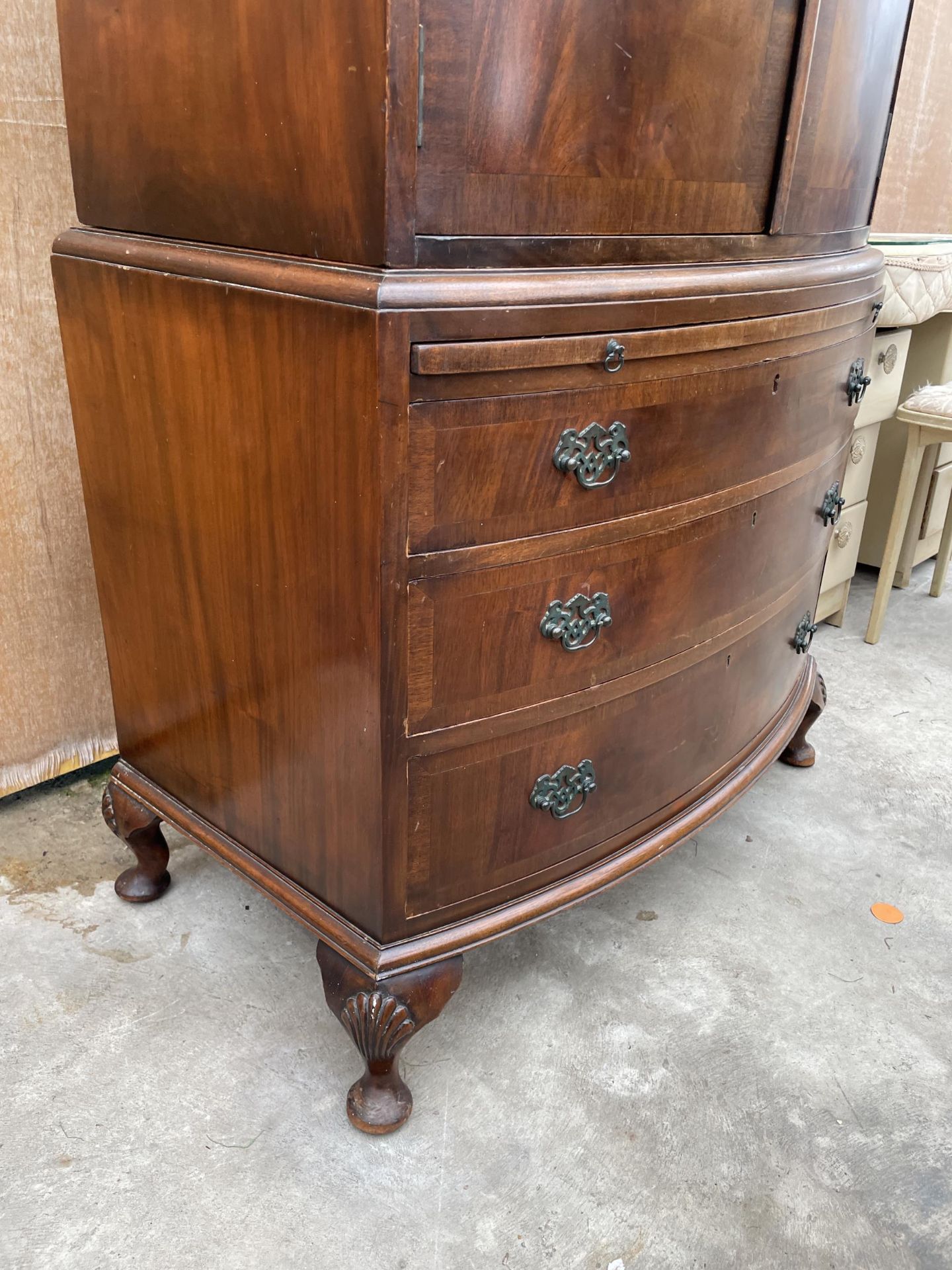 A 19TH CENTURY MAHOGANY AND CROSSBANDED BOWFRONTED PRESS STYLE CUPBOARD WITH THREE GRADUATED DRAWERS - Image 2 of 6