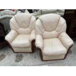 A PAIR OF GIGLI MOBILI TAPPEZZATI CREAM LEATHER EASY CHAIRS