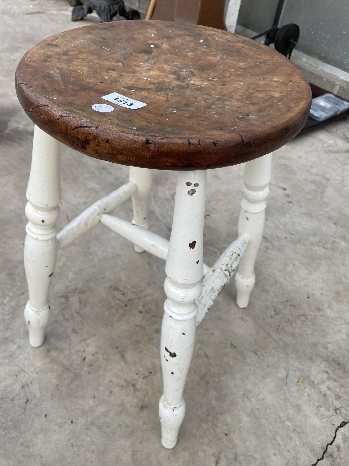 A VINTAGE PINE AND PARTIALLY PAINTED FOUR LEGGED STOOL - Image 2 of 3