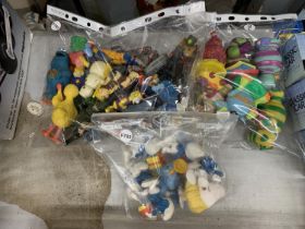 A QUANTITY OF FIGURES TO INCLUDE, FIMBLES, SMURFS, TOPCAT, SIMPSONS, COOKIE MONSTER, ETC.,