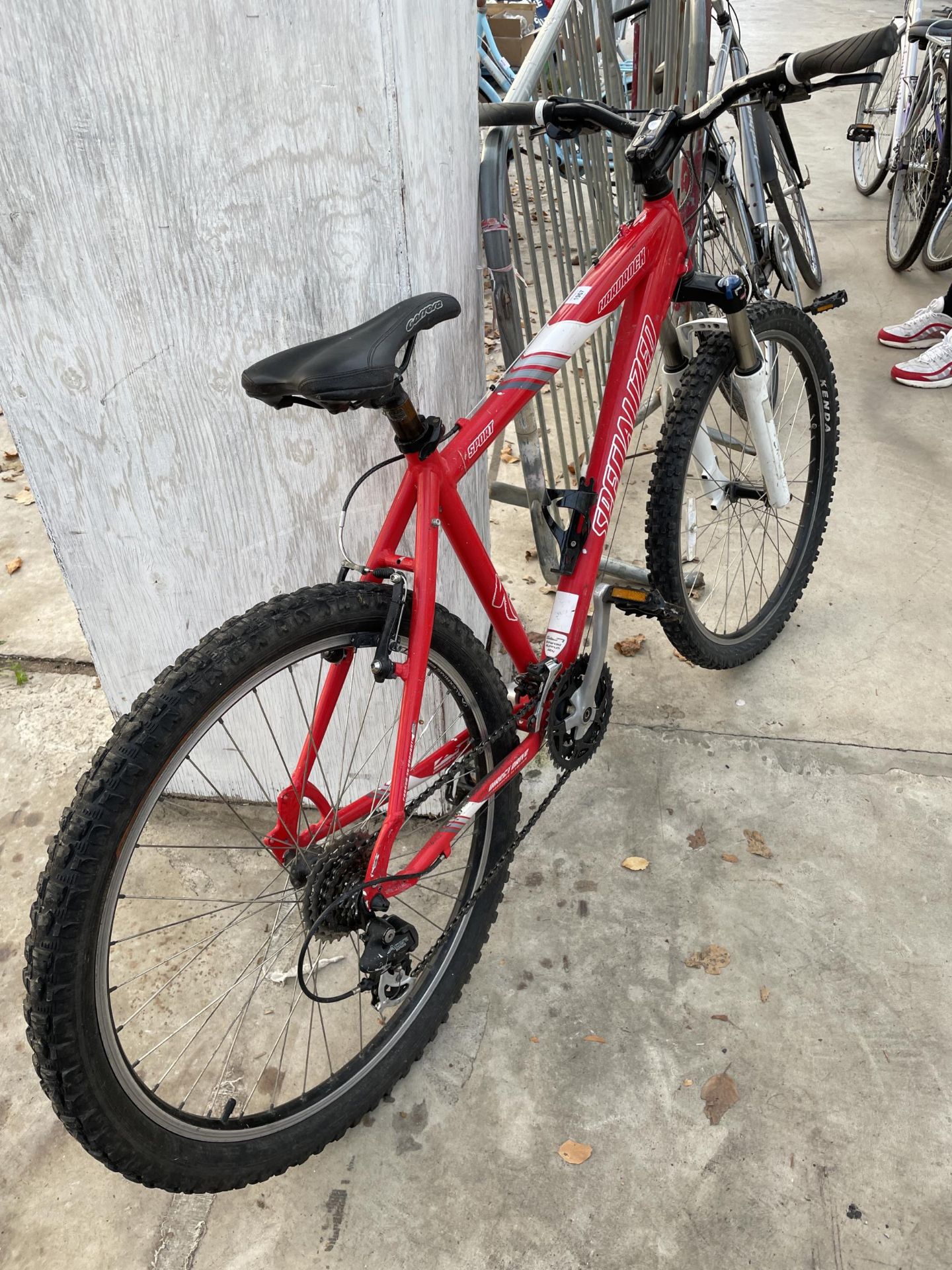 A HARDROCK SPECIALIZED MOUNTAIN BIKE WITH FRONT SUSPENSION AND 24 SPEED SHIMANO GEAR SYSTEM - Image 2 of 3
