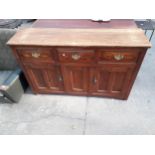 A VICTORIAN PITCH PINE DRESSER, 59" WIDE ENCLOSING THREE DRAWERS AND THREE CUPBOARDS