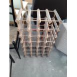 A TWENTY-EIGHT BOTTLE WINE RACK