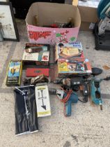 AN ASSORTMENT OF TOOLS TO INCLUDE TWO DRILLS AND HEAT GUNS ETC