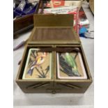 A VINTAGE CROCODILE SKIN EFFECT PLAYING CARD BOX WITH FOLD OUT DESIGN