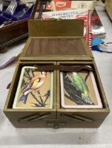 A VINTAGE CROCODILE SKIN EFFECT PLAYING CARD BOX WITH FOLD OUT DESIGN