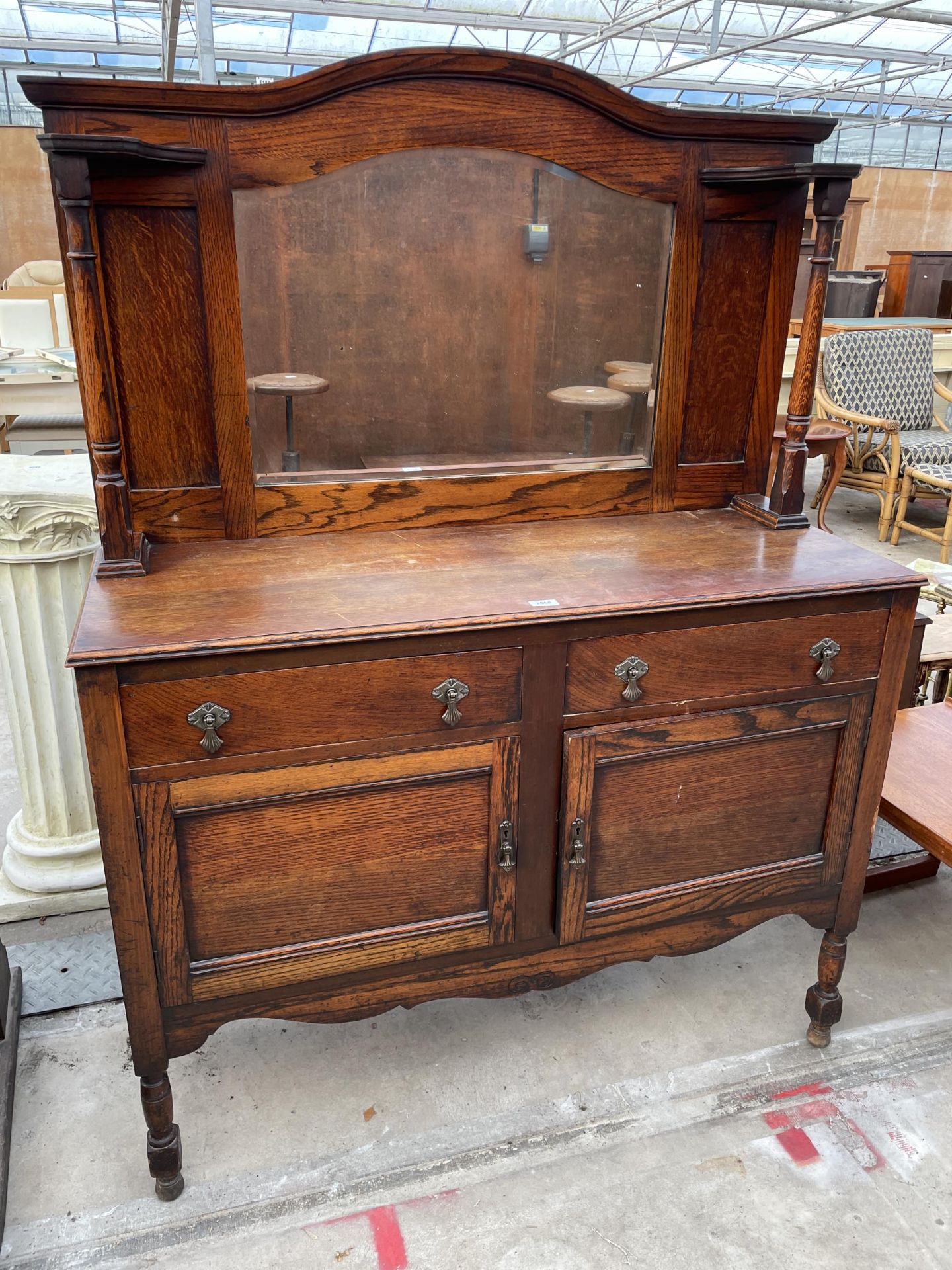 AN EARLY 20TH CENTURY OAK MIRROR-BACK SIDEBOARD, 47" WIDE