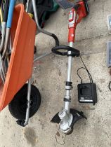 A BATTERY POWERED GARDEN STRIMMER WITH BATTERY AND CHARGER