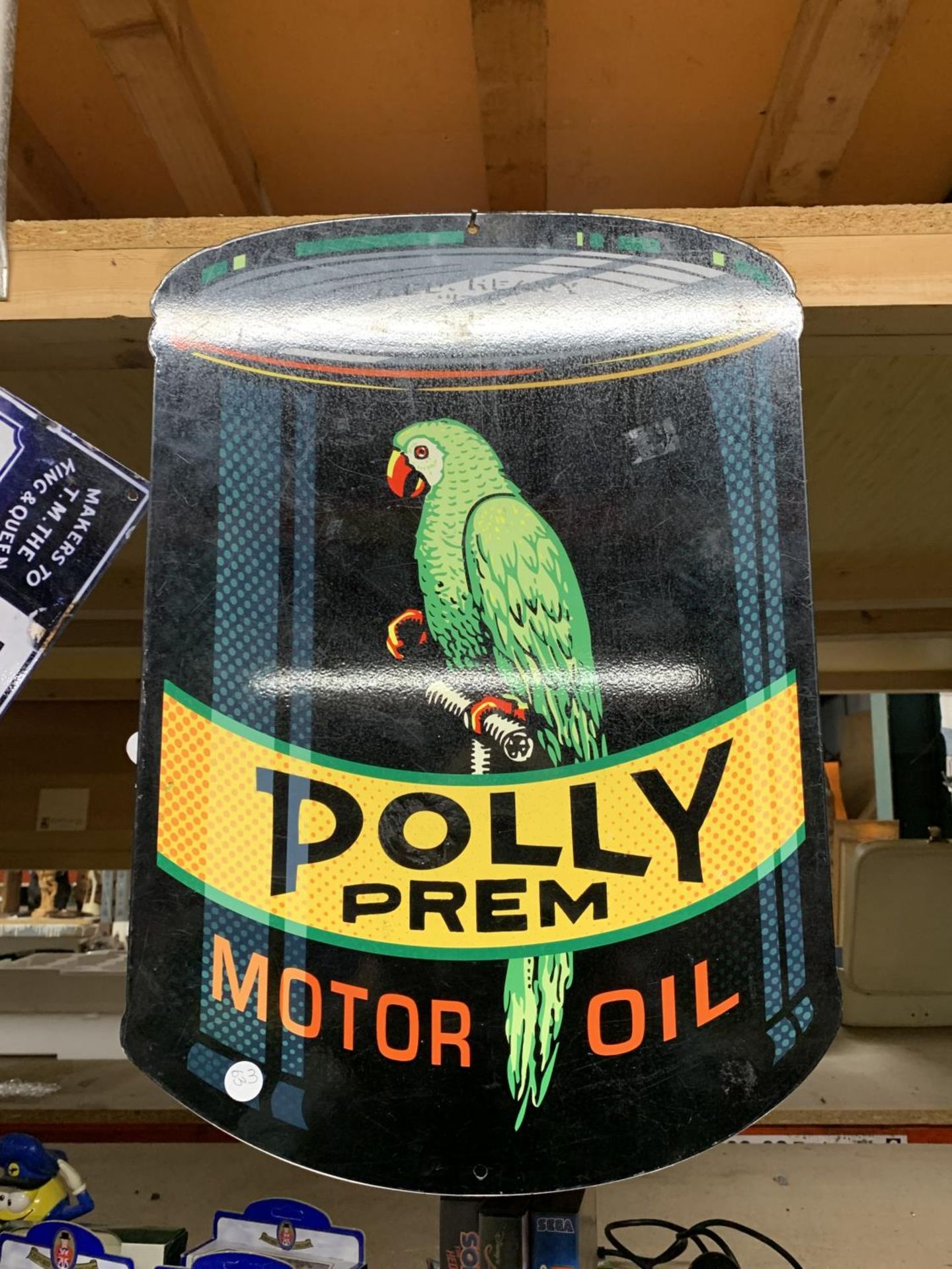 A 'POLLY' MOTOR OIL SIGN