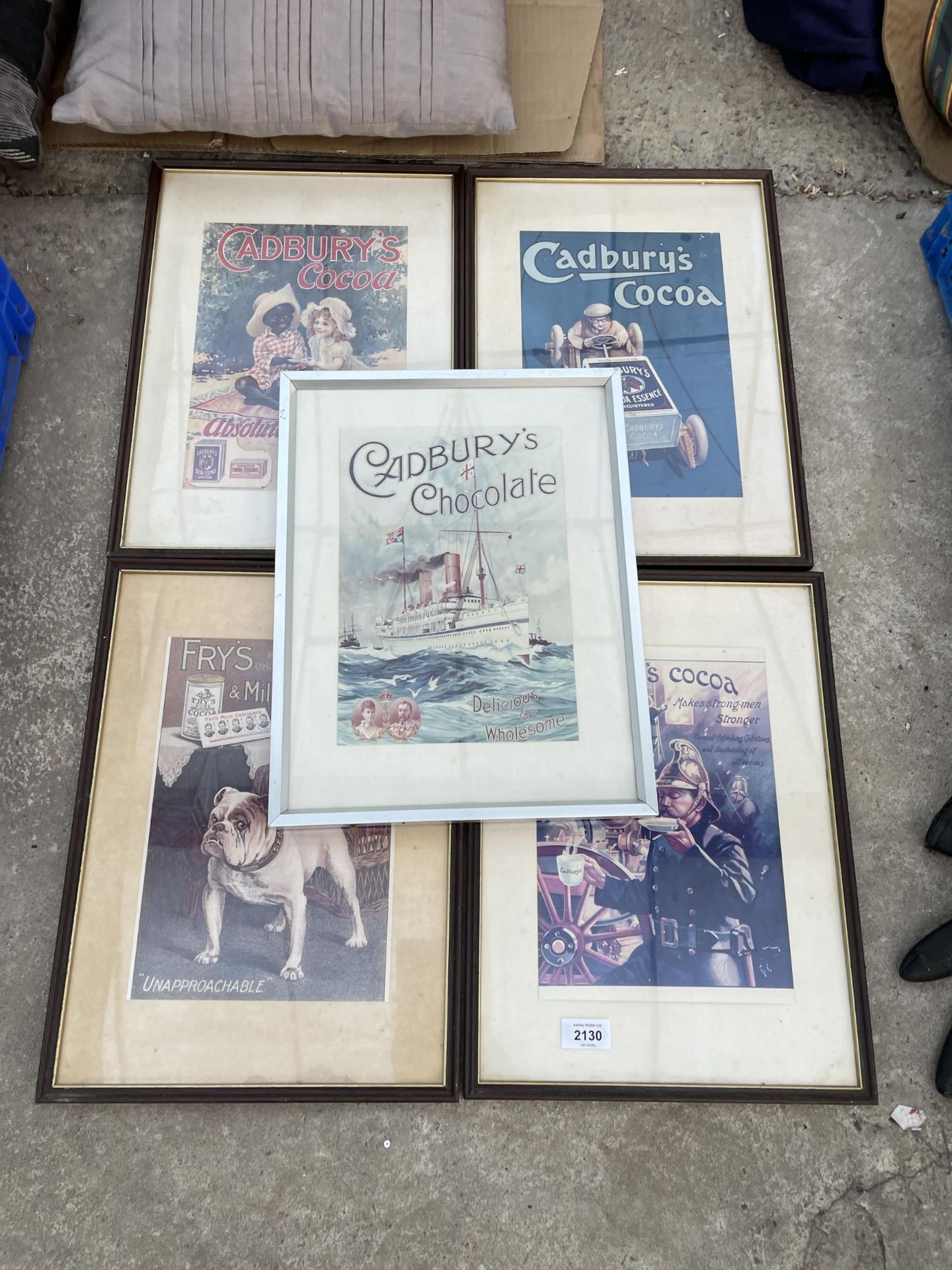 AN ASSORTMENT OF FRAMED ADVERTISING PRINTS