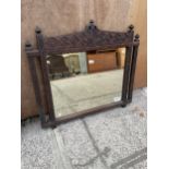 A HEAVILY CARVED OAK VICTORIAN WALL MIRROR, 36 X 32"