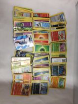 A LARGE COLLECTION OF POKEMON CARDS