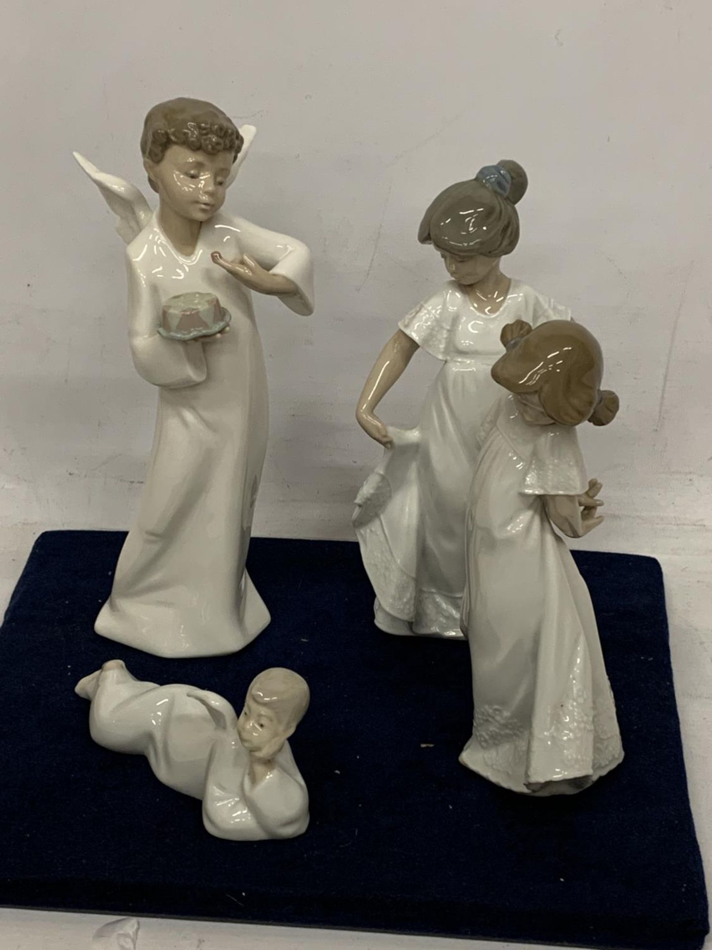 FOUR NAO FIGURINES TO INCLUDE TWO ANGELS AND TWO GIRLS