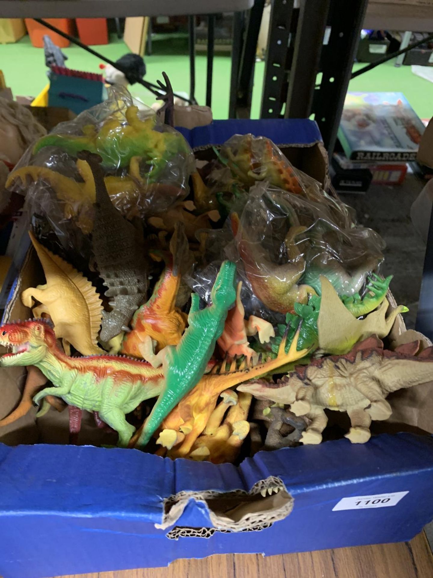 A LARGE QUANTITY OF TOY DINOSAUR FIGURES