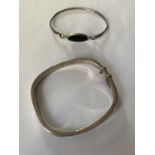 TWO SILVER BANGLES