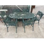 A LARGE VICTORIAN STYLE CAST ALLOY PATIO SET COMPRISING OF AN OVAL TABLE AND SIX CARVER CHAIRS