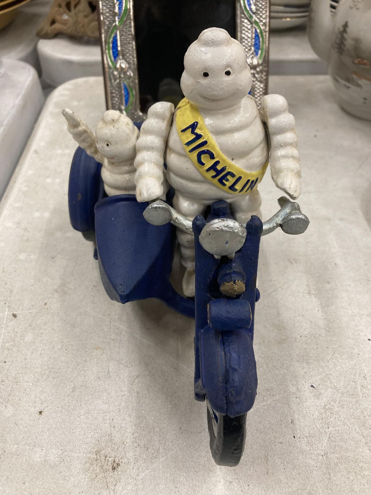 A CAST METAL MICHELIN MAN ON MOTORBIKE FIGURE - Image 2 of 5