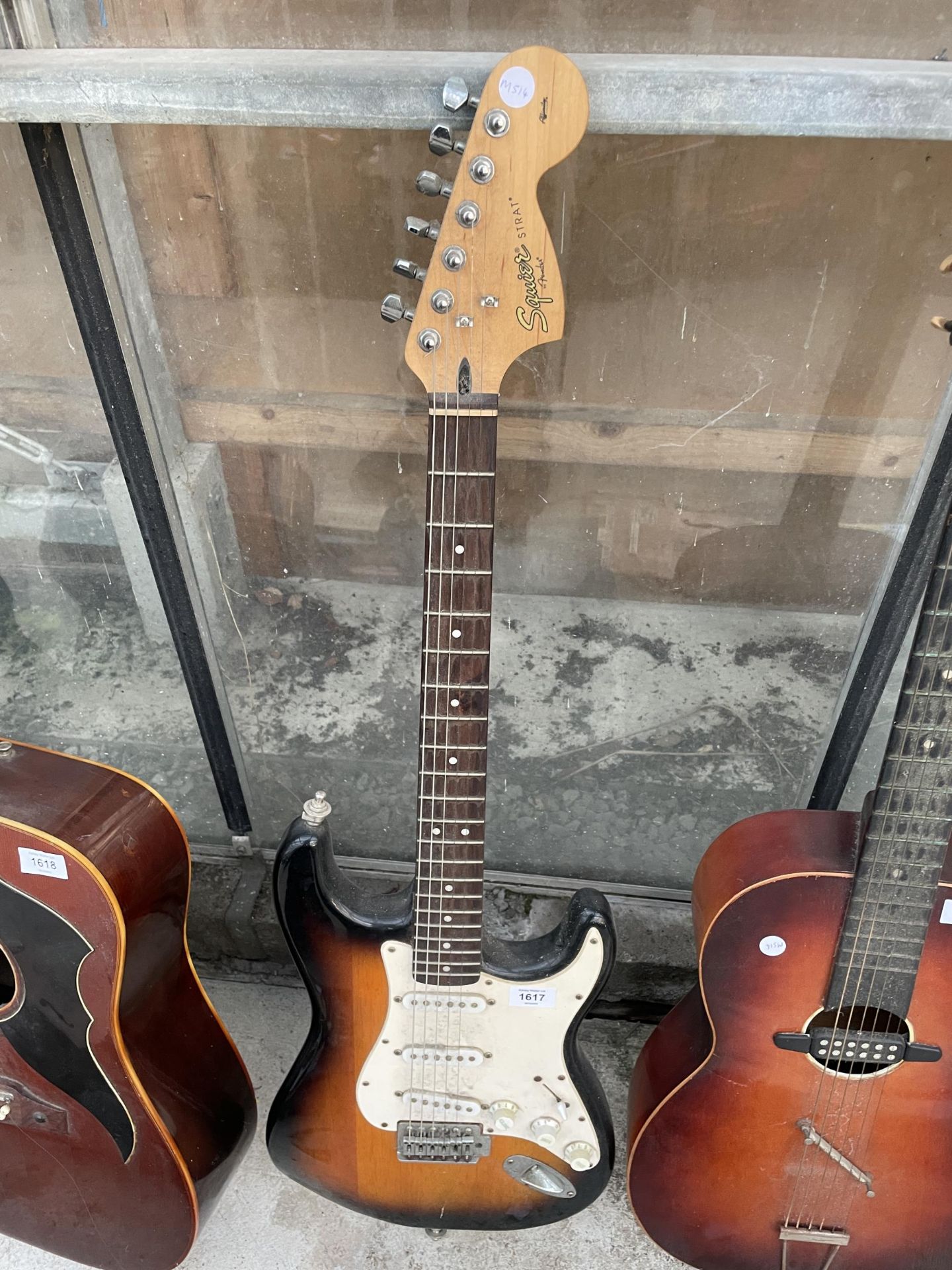A SQUIRE STRAT FENDER ELECTRIC GUITAR