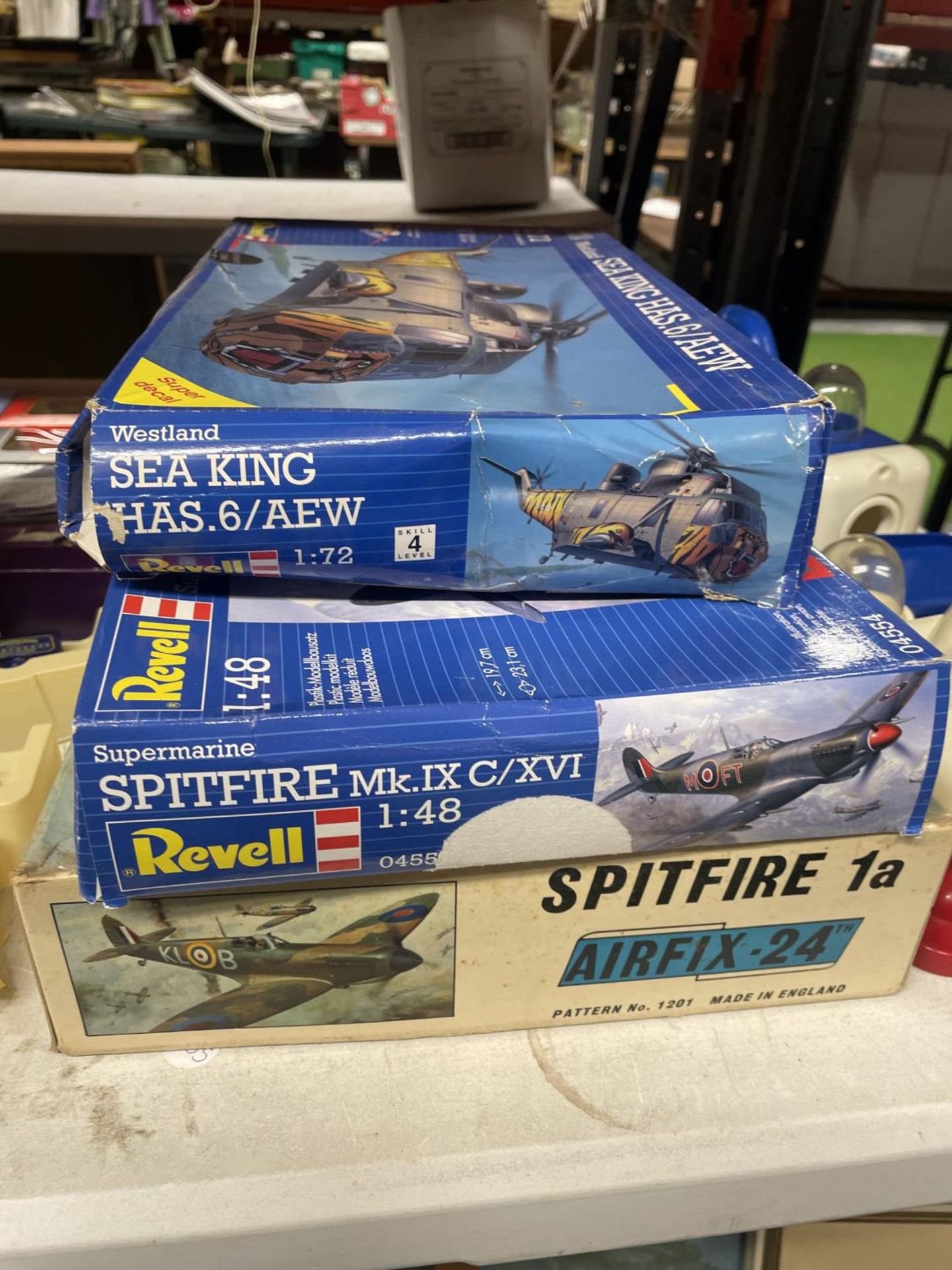THREE MODEL MAKING KITS TO INCLUDE AN AIRFIX SPITFIRE 1A, REVELL WESTLAND SEA KING HELICOPTER AND