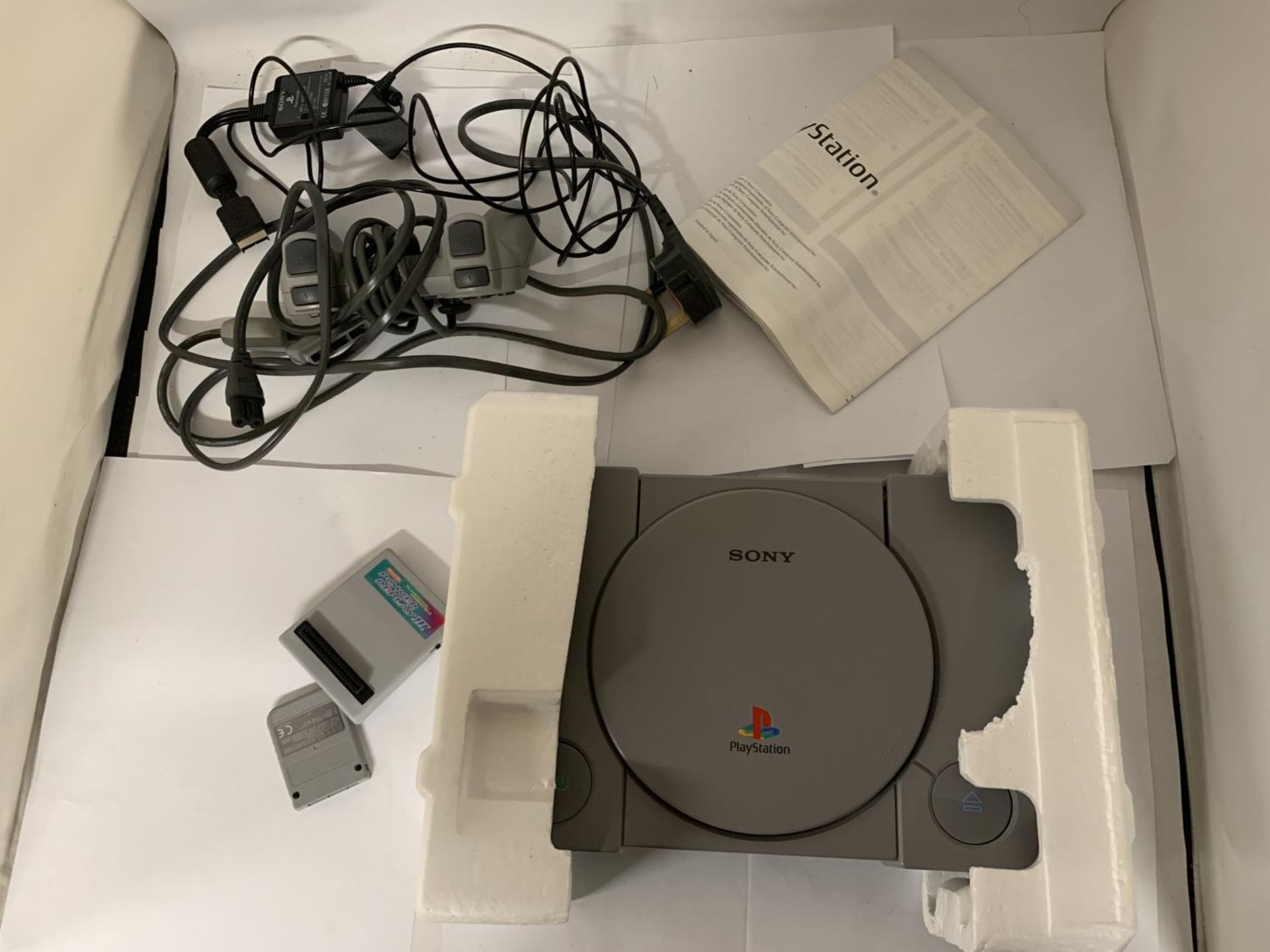 A BOXED PLAYSTATION ONE TOGETHER WITH DUAL SHOCK CONTROLLER - Image 2 of 4