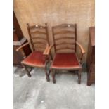 A PAIR OF LADDERBACK CARVER CHAIRS