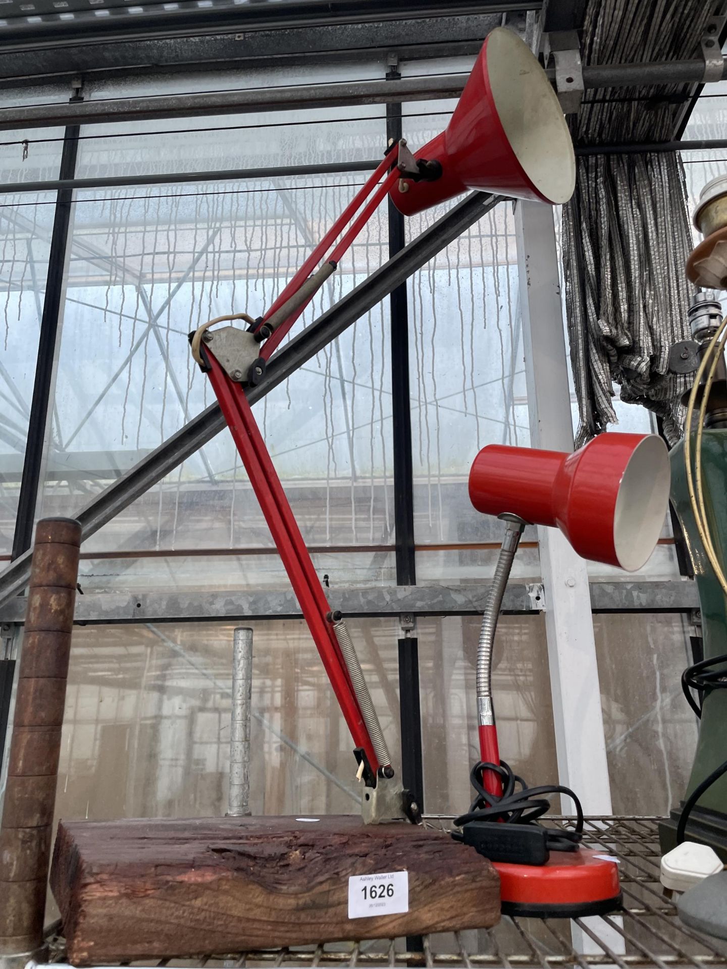 A VINTAGE RED ANGLE POISE LAMP AND A FURTHER ADJUSTABLE LAMP