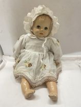 A LARGE VINTAGE DOLL WITH SLEEPY EYES