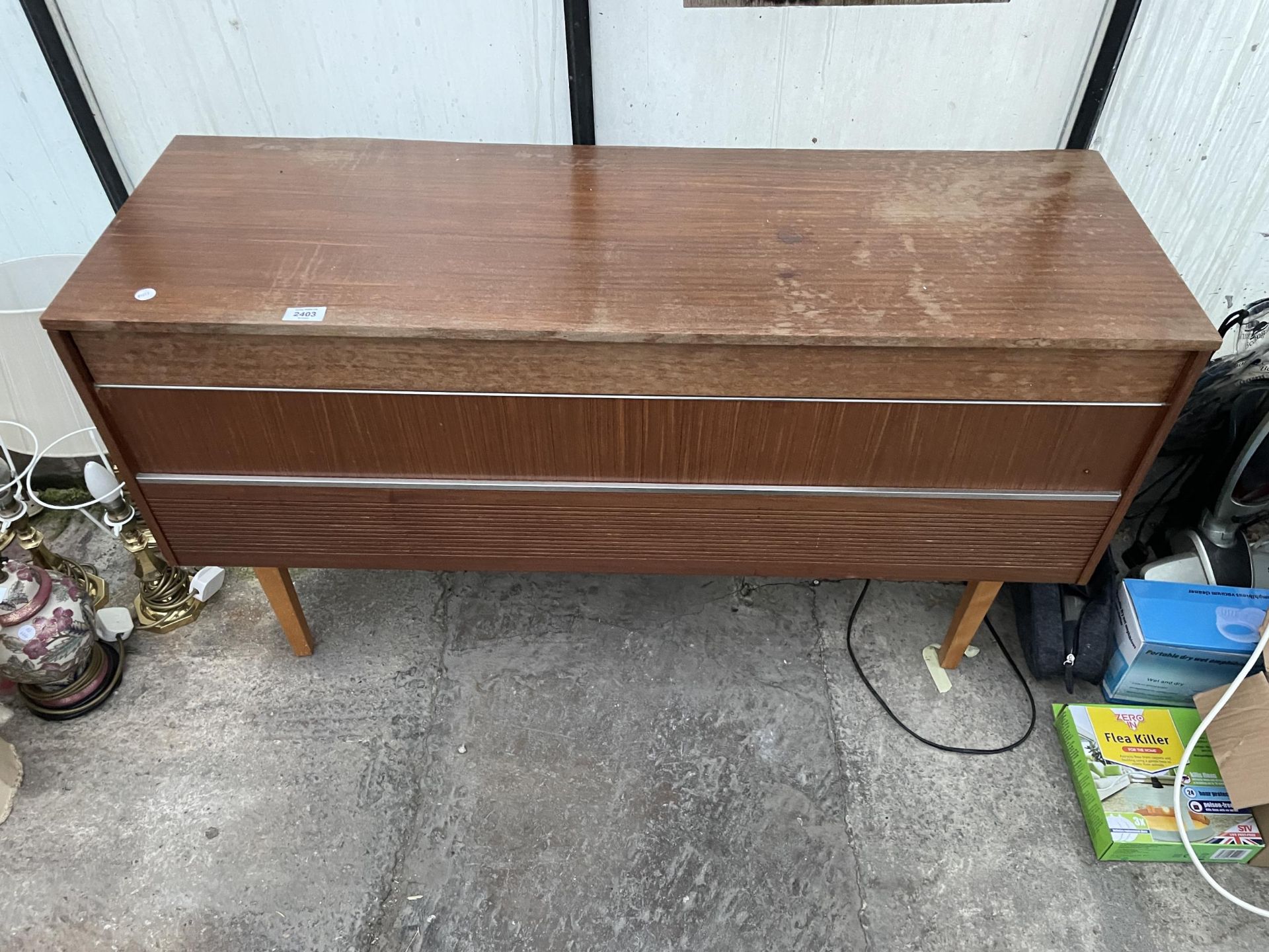 A RETRO TEAK RADIOGRAM WITH RECORD DECK AND BUSH SOLID STATE STEREO