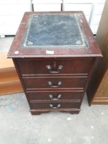 A MODERN MAHOGANY TWO DRAWER FILING CABINET WITH INSET LEATHER TOP