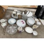 AN ASSORTMENT OF CERAMIC AND GLASS WARE TO INCLUDE CUPS AND A CLARET JUG ETC