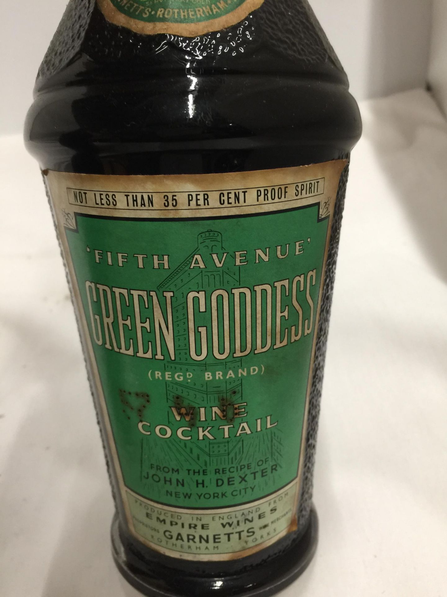 THREE MIXED BOTTLES - GILBEY'S WINE COCKTAIL, DE KUYPER ORIGINAL PEACHTREE AND GREEN GODDESS WINE - Image 4 of 4