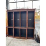 A 19TH CENTURY BREAKFRONT OPEN BOOKCASE WITH FOUR SECTIONS TO THE UPPER PORTION AND BASE, 93"
