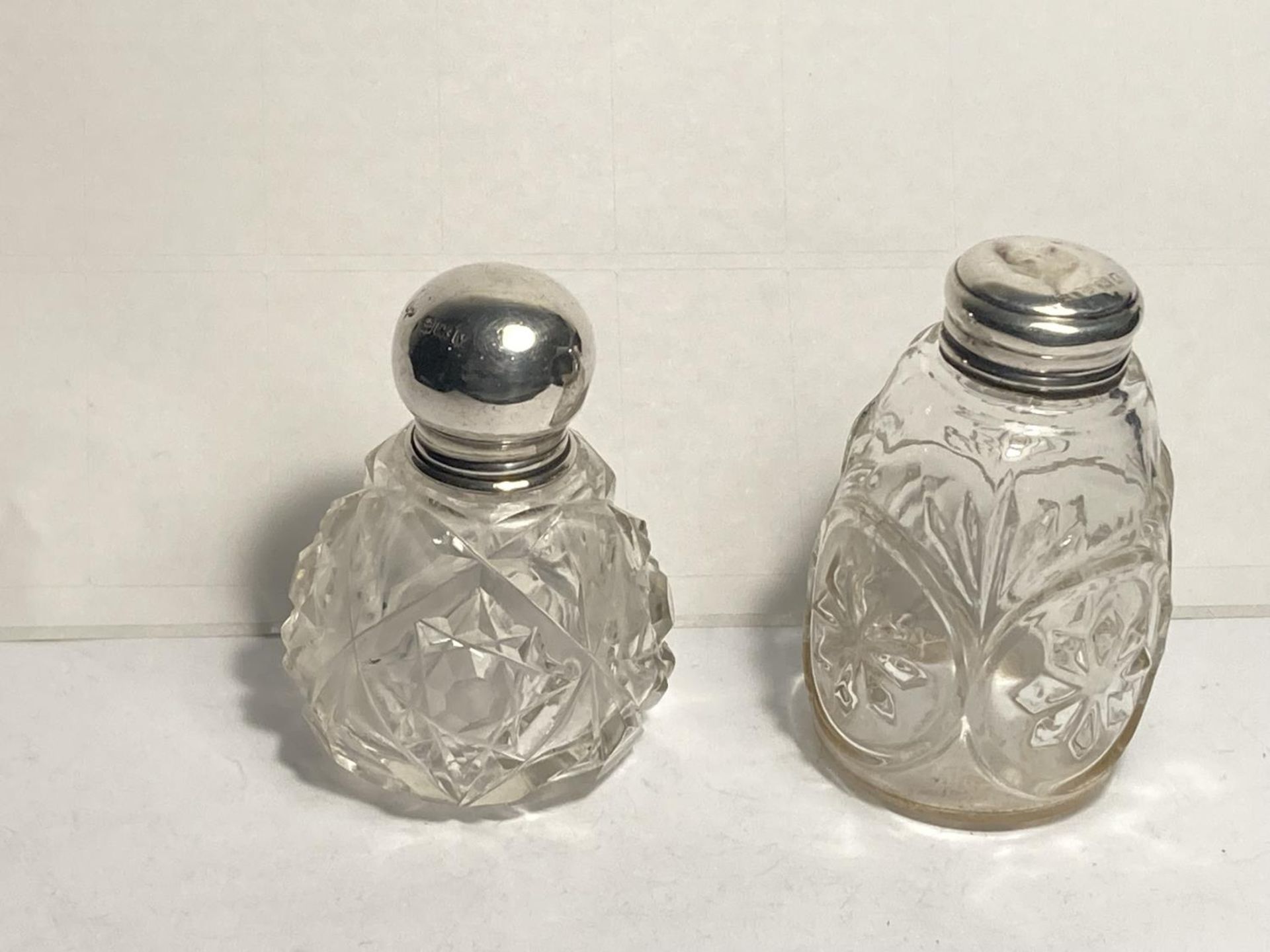 TWO CUT GLASS BOTTLES WITH HALLMARKED SILVER TOPS ONE BIRMINGHAM AND ONE INDISTINCT - Image 2 of 5