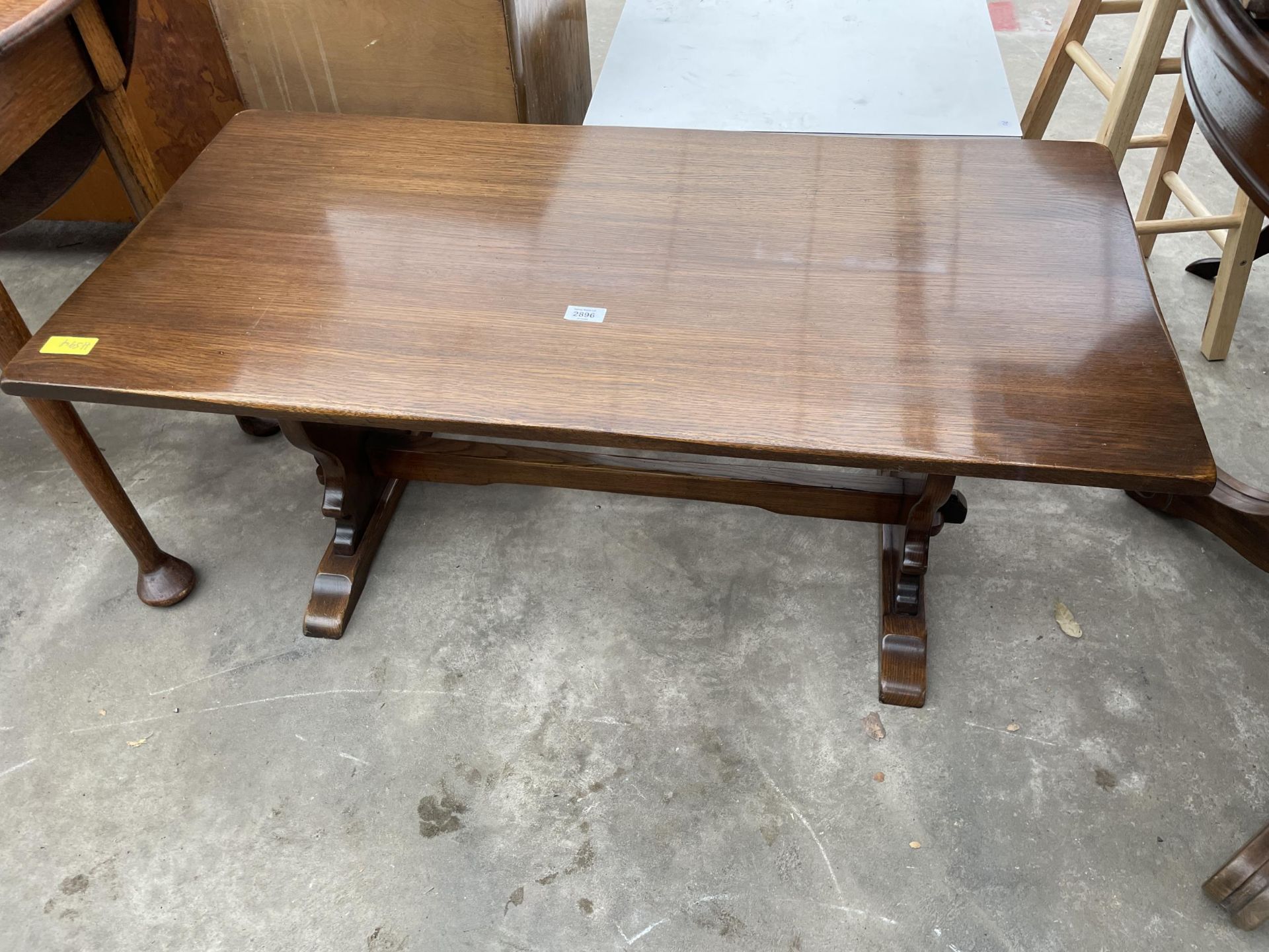 A MODERN OAK REFECTORY STYLE COFFEE TABLE, 42 X 21"