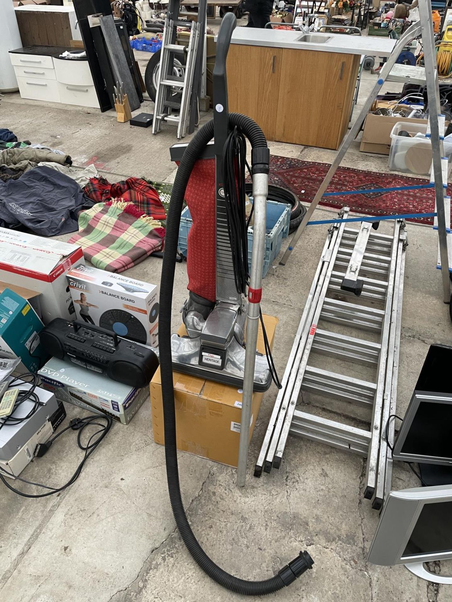 A KIRBY HERITAGE HOOVER AND ACCESSORIES